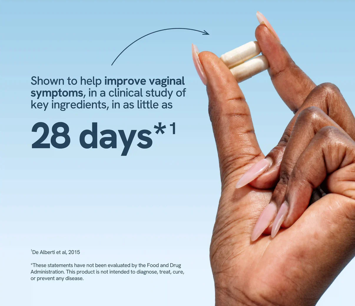 Hands holding vaginal health supplements against a light blue background.