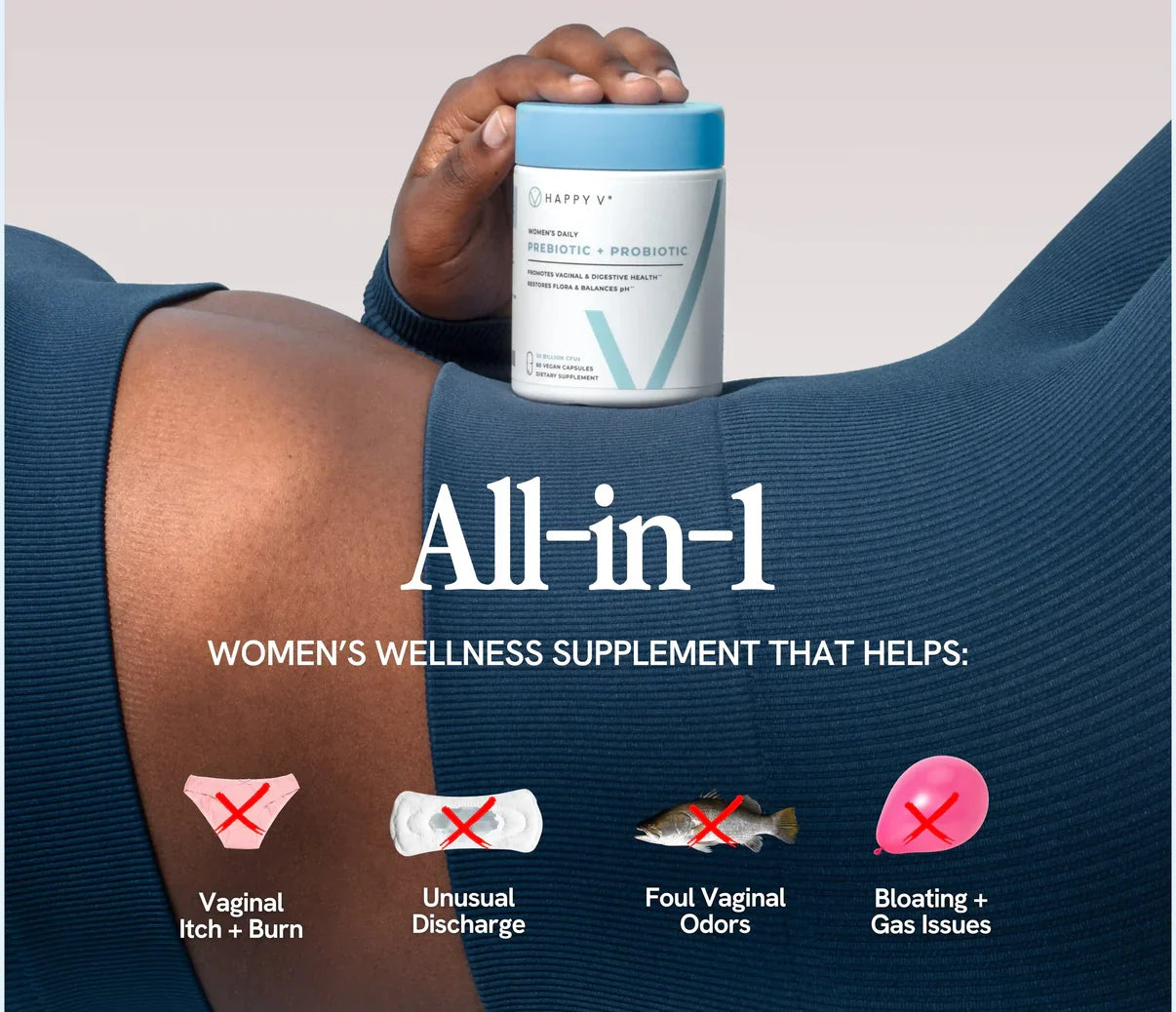 Women's wellness supplement Happy V probiotic for vaginal health, placed on a woman's thigh.